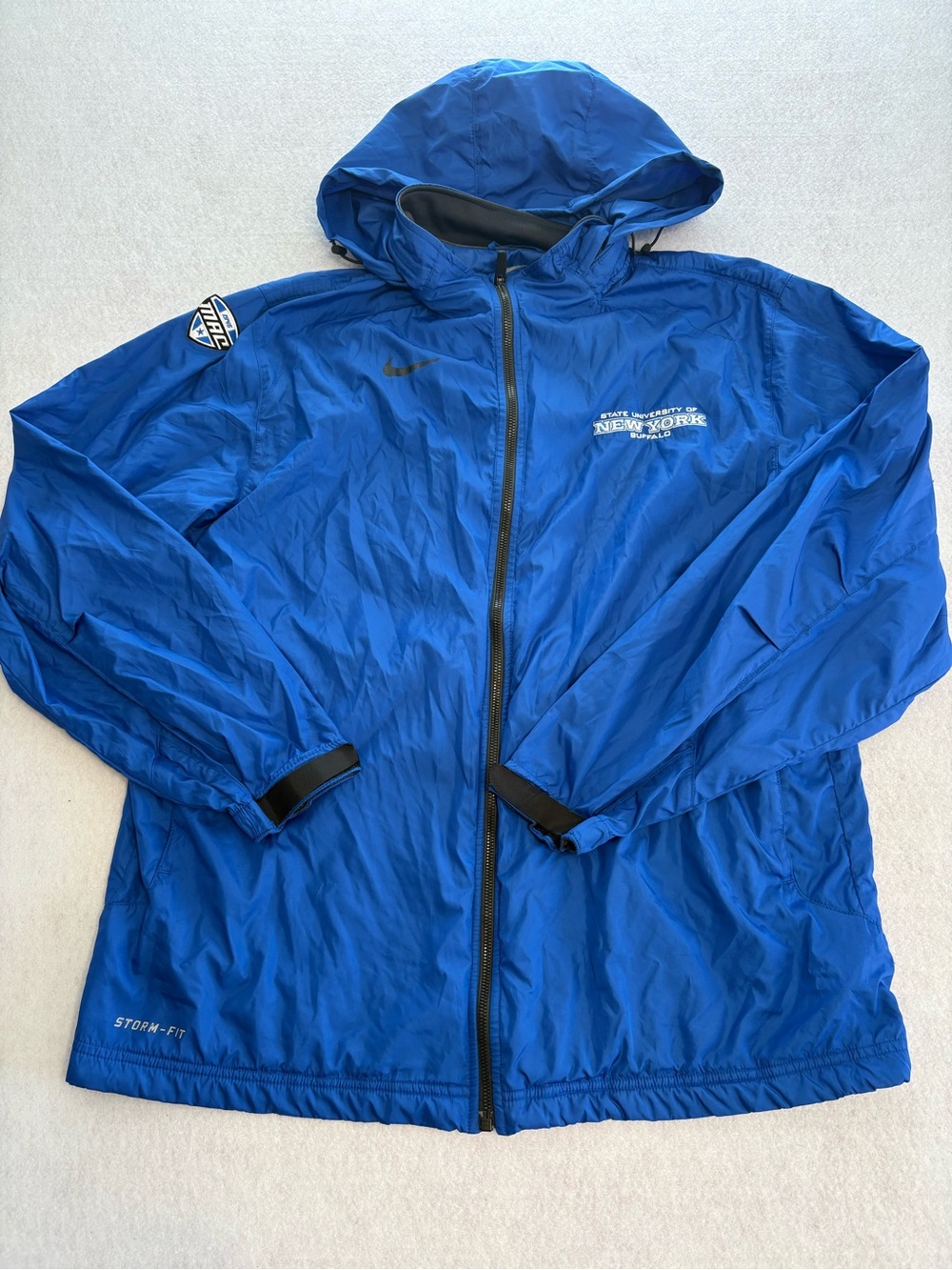 Nike men’s university of Buffalo Blue Hooded Storm-Fit Rain Jacket